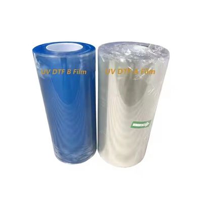 Chłodne, gorące peeling Ab A3 UV DTF Pet Film Roll Przejrzysty DTF Transfer Film 60cm Custom